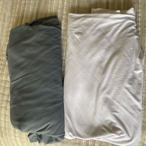Two Mebie baby stretch swaddles